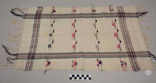 Servilleta, small white textile, bands of multicolored lines in both directions, birds and human figures, fringes