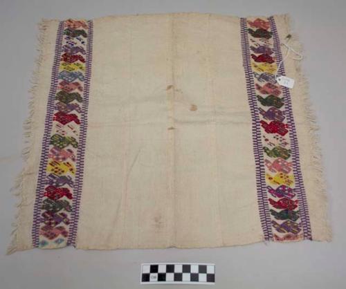 Servilleta, small multipurpose cloth, white with bands of multicolored zoomorphic images at either end, fringed