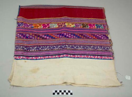 Huipil, women's shirt, neck hole cut, sides unstitched, white with multicolored geometric and zoomorphic designs and red shoulder pannels