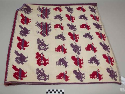Huipil, women's shirt, two panels, head hole cut, white with lavender and red zoomorphic and geometric designs
