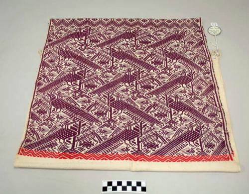 Half huipil, one piece, white with purple birds, trees, and diamonds and small bands of dark pink geometric designs at edges