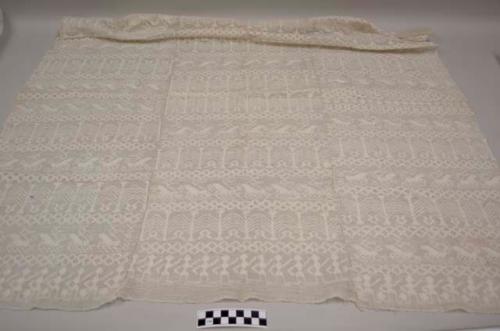 Huipil, women's shirt, three pannels, no head hole, white with white geometric, floral, and figurative designs