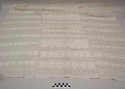 Huipil, women's shirt, three pannels, no head hole, white with bands of gauze weave and white geometric designs
