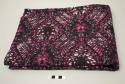 Dutch wax block print textile; pink, purple and white abstract pattern