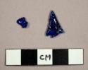 Fake glass projectile point in two fragments