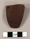 Stone atlatl weight, broken