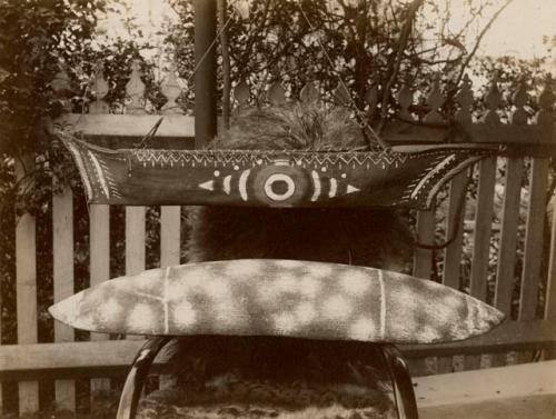 Aboriginal Coolamon and Small Decorated Canoe