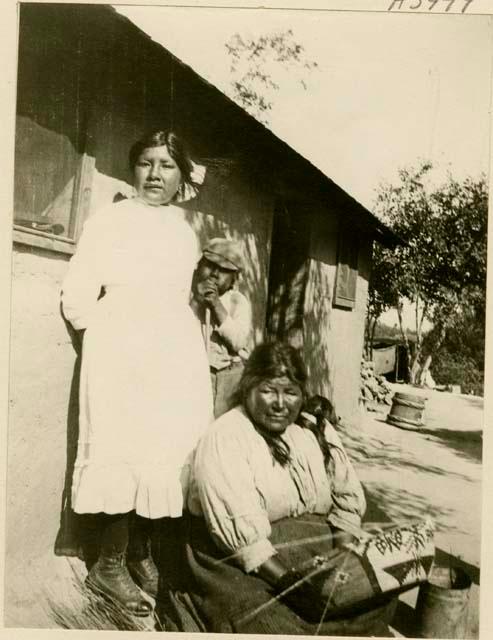 Mrs. Pino with daughter Isabella and boy