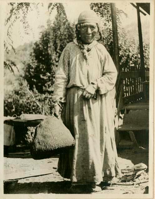 Karuk woman holding basket