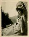 Grace Nicholson resting after climbing rocks