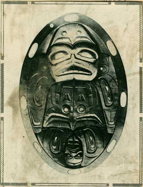 News clipping showing a carved shale dish, symbolic of the owner's wealth