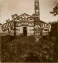 Chief's house and totem. Sanyakoan tribe.
