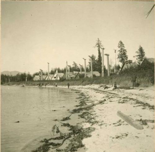 Village alongside shore. Sanyakoan tribe.