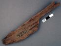Wood, worked flat fragment, with handle-like protusion