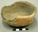 Outcurved bowl; crudely finished; broken side, fireclouds, rounded bottom - gila