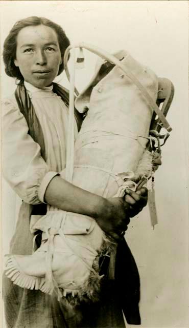 Helen Jackson, a Thompson River Indian woman with baby carrier and baby