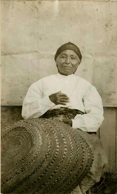 Upper Thompson River woman "S'wixa" with large burden basket, made by herself