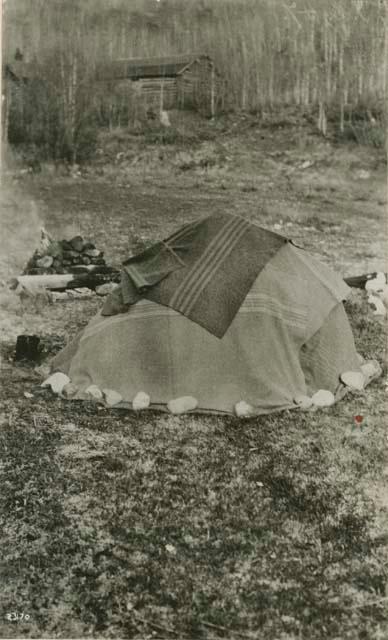 Sweathouse covered with blankets showing common Thompson style