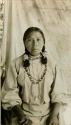 Thompson River Indian woman "TEkwitlixkEn" showing hair style of pubescent girls