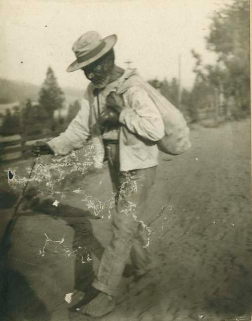 Blind Tom; Man walking barefoot