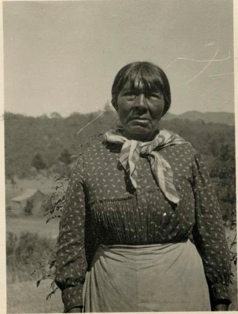 Pomo weaver, posing for photo