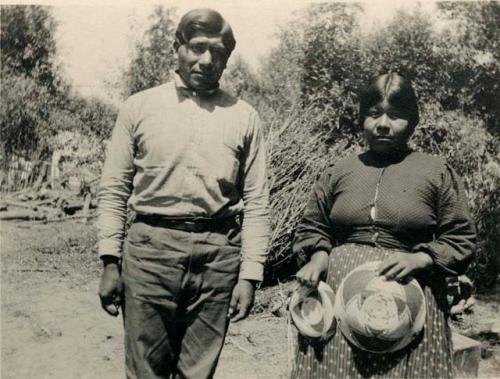 Anna and Yonti Bome; Lake Co. holding baskets