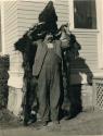 William Benson modeling the Pomo bearskin disguise now in the Peabody Museum