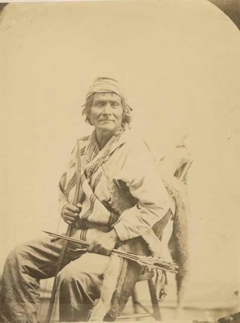 Studio portrait of an Apache man