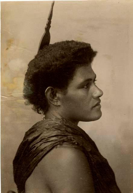 Studio portrait of a Fijian woman, in profile