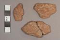 Cooma Striated Potsherds: Cooma Variety (Red-brown, early, punched)