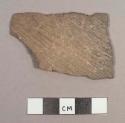 Cooma Striated Potsherd: Red-brown Early Variety