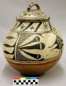 Large painted pottery jar with cover.