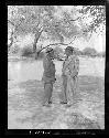 Laurence Marshall and John Neser standing together, talking