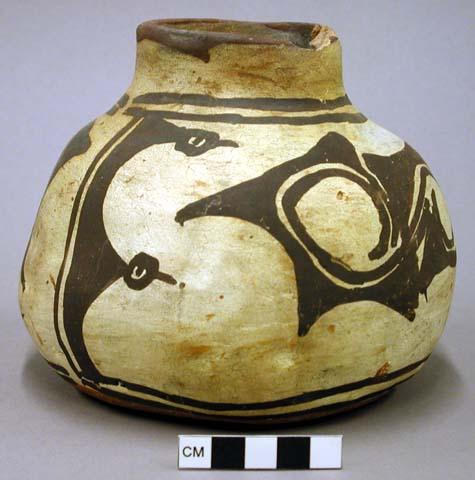 Jar, polacca polychrome style c. zuni rain bird design. 12.9 x 14.9 cm.