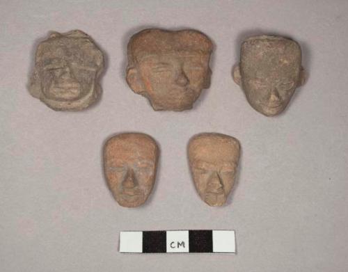 Terra cotta heads (human)