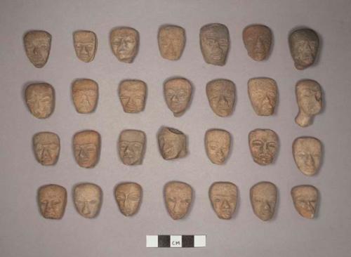 Terra cotta heads (human)