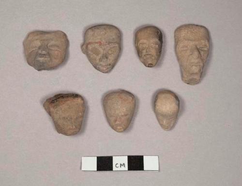 Pottery figurine heads