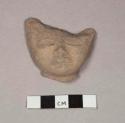 Pottery figurine head fragments