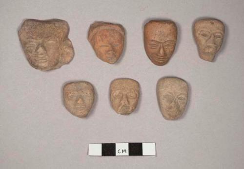 Heads, terra-cotta