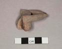 Pottery figurine fragment-arms outstretched in front with hands together