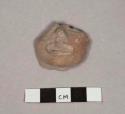 Pottery figurine head fragment