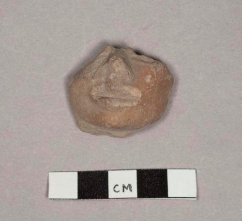 Pottery figurine head fragment