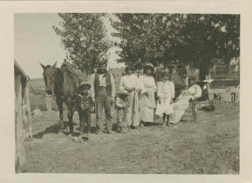 Adam Hess's family, posing with horse