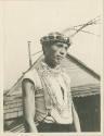 Robert Frank, nephew of Captain Spot wearing headdress and bead necklace