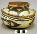 Jar, polacca polychrome style c. zuni rain bird design. 10.5 x 14.7 cm.