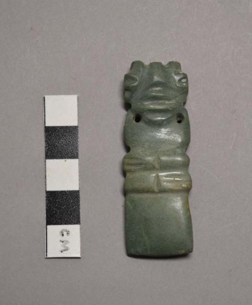 Carved anthropomorphic jade pendant