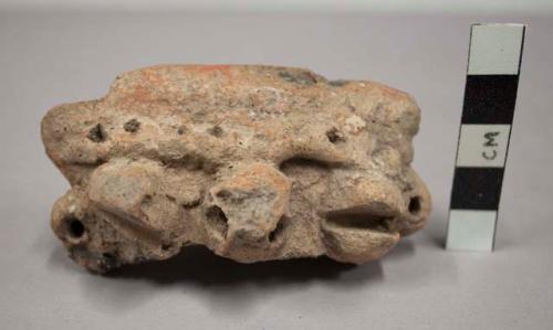 Fragment of pottery figurine