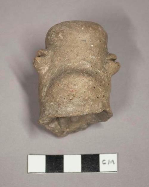 Pottery vessel spout, human head