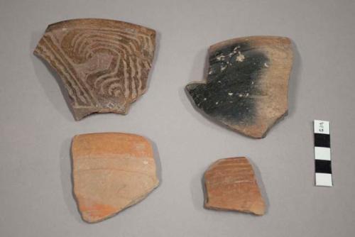 Tan incised potsherds- partly polished