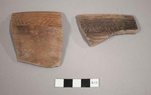 Two incised "cuneform" potsherds